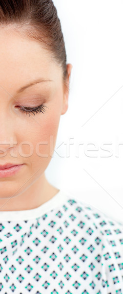 Deprimido femenino paciente mirando suelo blanco Foto stock © wavebreak_media
