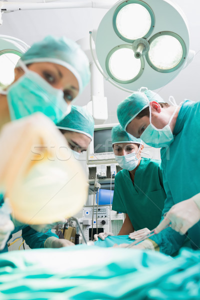 Hemşire oksijen maskesi cerrahlar tiyatro hastane Stok fotoğraf © wavebreak_media