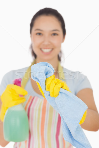 Felice donna pulizia finestra panno spray Foto d'archivio © wavebreak_media