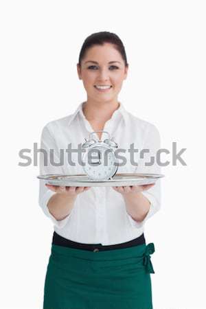Waitress holding an alarm clock on a silver tray Stock photo © wavebreak_media