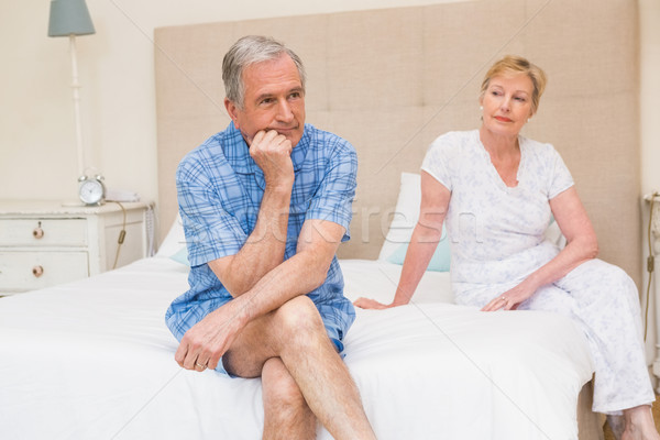 Senior couple not speaking after an argument on bed Stock photo © wavebreak_media