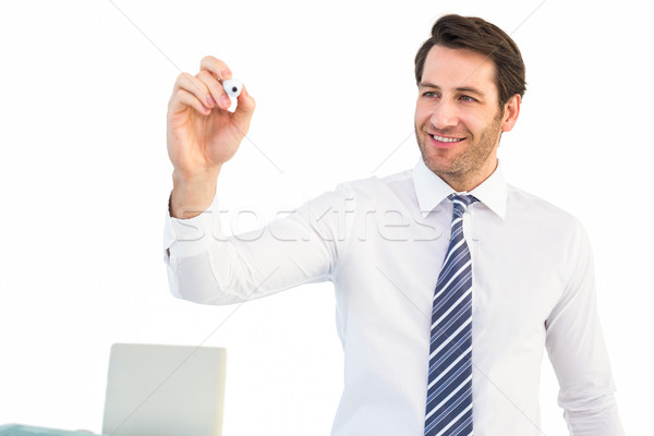 Glimlachend zakenman schrijven zwarte fiche witte Stockfoto © wavebreak_media