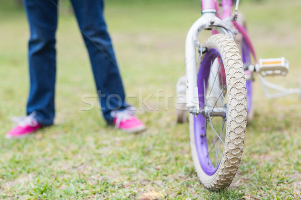 Kislány bicikli park nő tavasz boldog Stock fotó © wavebreak_media