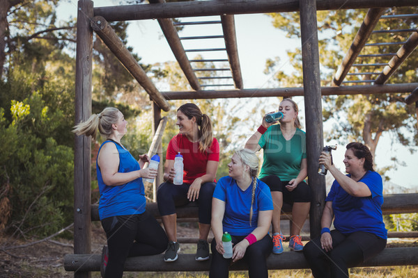 Group of women drinking water in the boot camp Stock photo © wavebreak_media