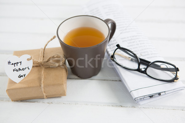 Stock photo: High angle view of coffee cup by fathers day gift