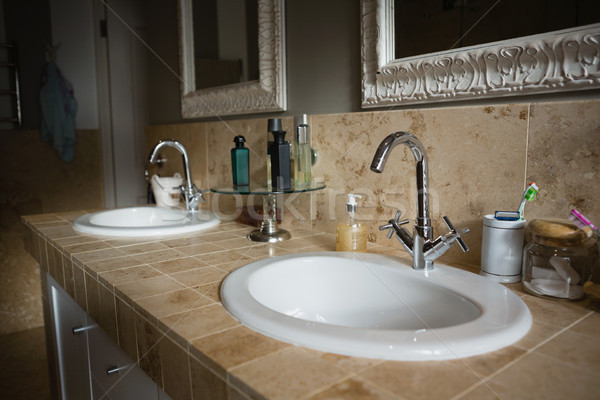 Faucet on sink in bathroom Stock photo © wavebreak_media