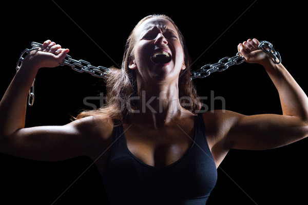 侵略性 女 運動員 鏈 黑色 商業照片 © wavebreak_media