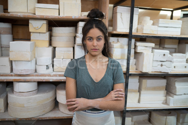 Femminile piedi braccia incrociate ceramica workshop business Foto d'archivio © wavebreak_media