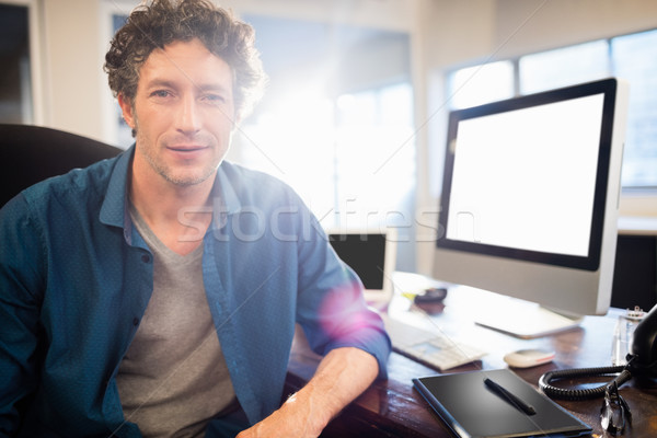 Businessman sitting on a swivel chair Stock photo © wavebreak_media