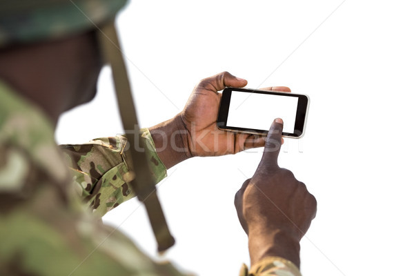 żołnierz telefonu komórkowego biały piłka nożna zabawy ekranu Zdjęcia stock © wavebreak_media
