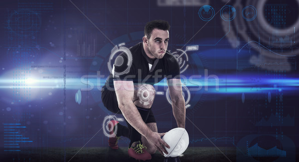 Composite image of rugby player getting ready to kick ball Stock photo © wavebreak_media