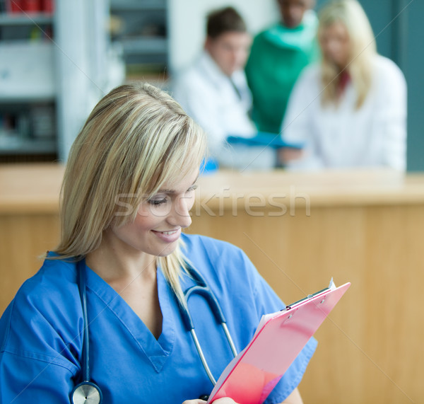 Retrato agradable femenino cirujano equipo detrás Foto stock © wavebreak_media
