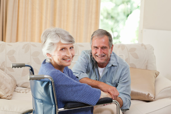 Stock photo: Mature couple looking at the camera