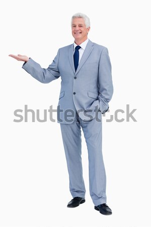 Stock photo: Portrait of a happy  businessman praising against white babckground