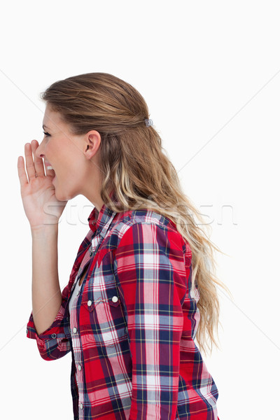 Portrait of a woman shouting against a white background Stock photo © wavebreak_media