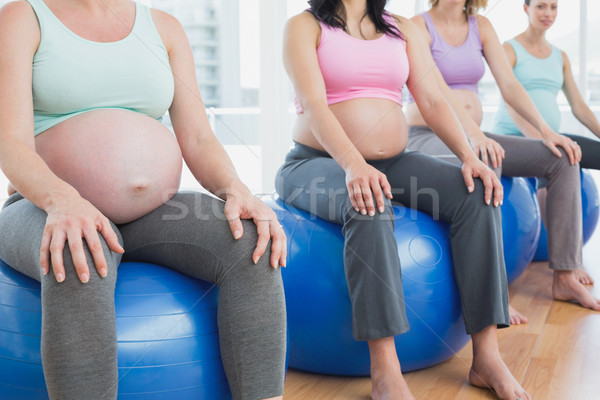 Hamile kadın oturma egzersiz uygunluk Stok fotoğraf © wavebreak_media