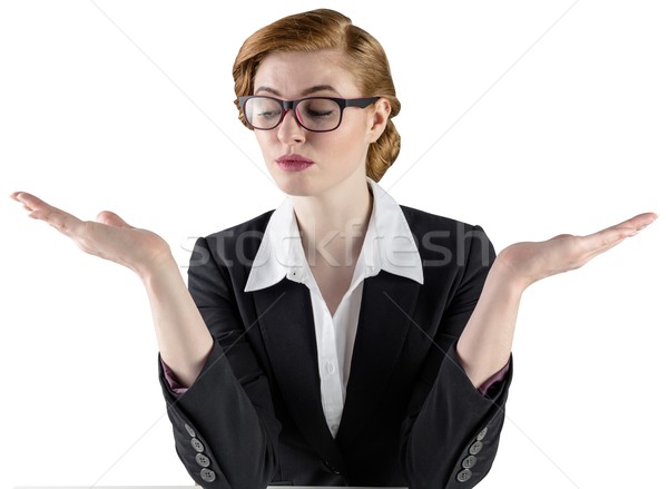 Businesswoman holding hands out in presentation Stock photo © wavebreak_media