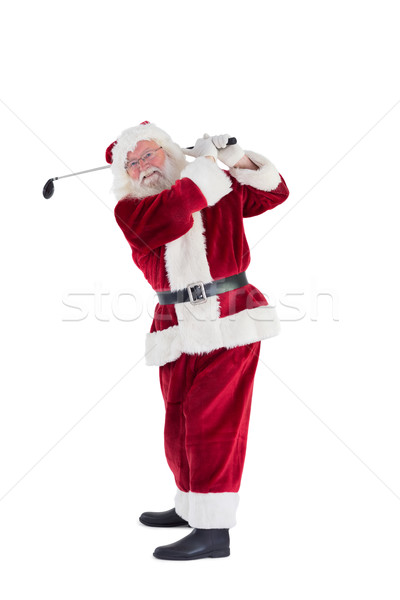 Santa Claus swings his golf club Stock photo © wavebreak_media