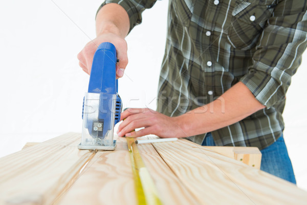 Stockfoto: Timmerman · houten · plank · elektrische · zag