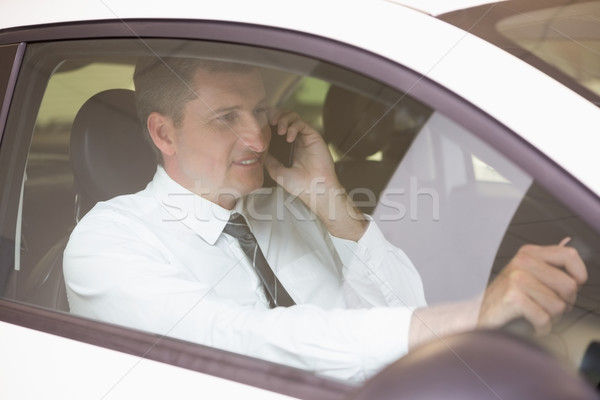 Sorridente homem telefone carro sala de exposição Foto stock © wavebreak_media