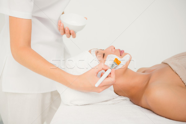 Stock photo: Attractive woman receiving treatment at spa center