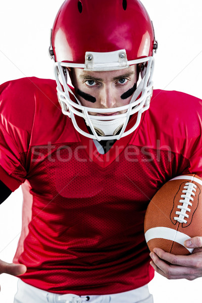 Portrait of focused american football player being ready to atta Stock photo © wavebreak_media