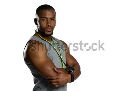 Stock photo: Portrait of young sportsman with ball running while playing rugby