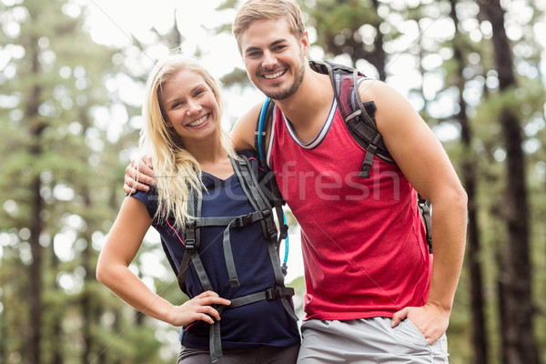Happy young couple looking at camera Stock photo © wavebreak_media