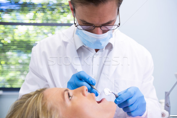 Close up of doctor examining patient Stock photo © wavebreak_media