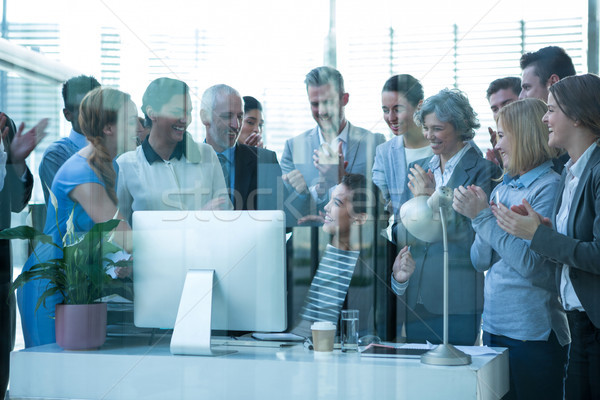 Stock photo: Businesspeople applauding on their colleagues presentation