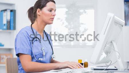 Doctor examining a patient Stock photo © wavebreak_media