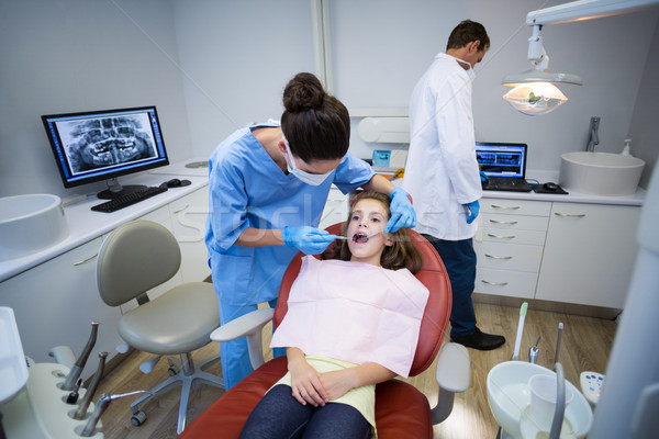 Zahnarzt jungen Patienten Werkzeuge Frau Stock foto © wavebreak_media