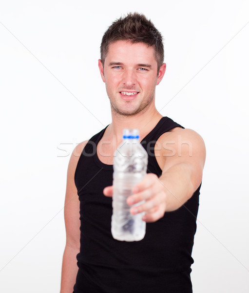 Heureux une bouteille d'eau jeunes homme [[stock_photo]] © wavebreak_media