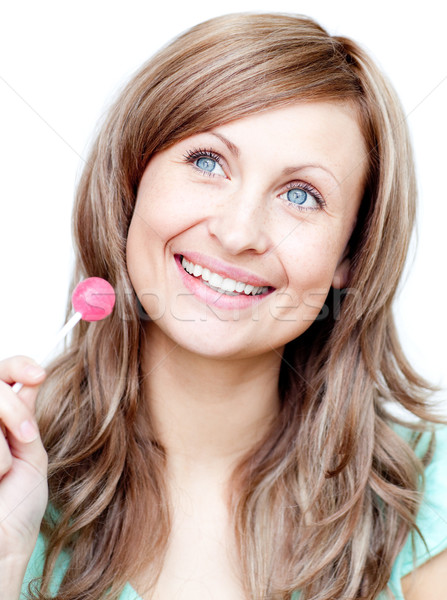 Delighted woman holding a lollipop  Stock photo © wavebreak_media