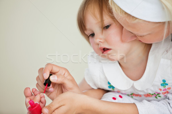Happy mother playing with her amazed daughter in bathroom Stock photo © wavebreak_media