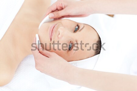 Attractive blond-haired woman relaxing while lying down in a Spa centre Stock photo © wavebreak_media