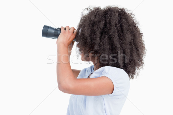 Widok z boku kobieta patrząc lornetki biały Zdjęcia stock © wavebreak_media