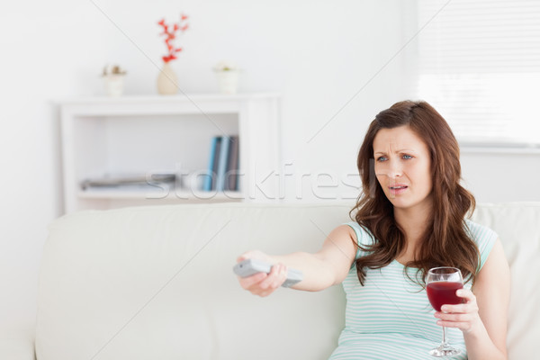 Femme séance canapé verre vin [[stock_photo]] © wavebreak_media