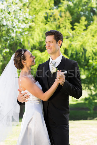 Newly wed couple dancing on wedding day Stock photo © wavebreak_media