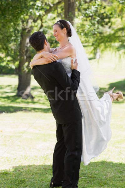 Groom lifting bride in garden Stock photo © wavebreak_media