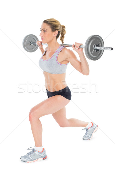 Sérieux Homme barbell derrière tête [[stock_photo]] © wavebreak_media