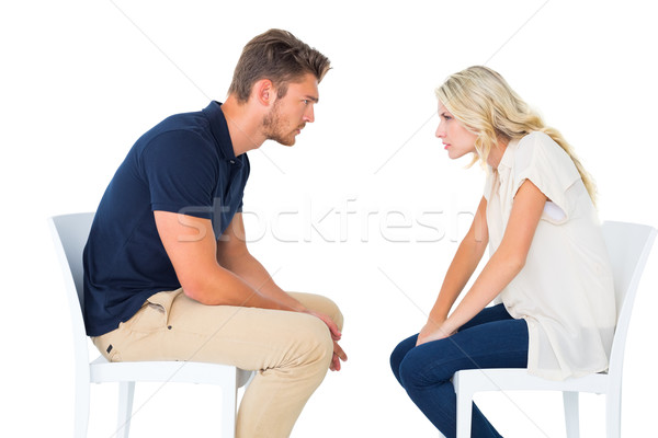 Young couple sitting in chairs arguing Stock photo © wavebreak_media