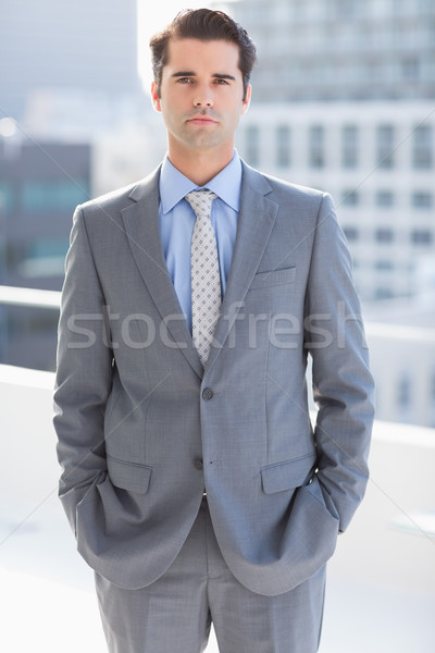 Unsmiling businessman looking at camera Stock photo © wavebreak_media