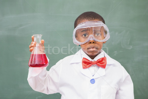 Sad pupil holding at a red liquid  Stock photo © wavebreak_media
