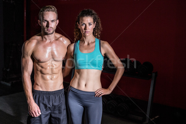 Muscular couple looking at the camera Stock photo © wavebreak_media