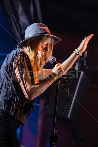 Singer performing on stage Stock photo © wavebreak_media