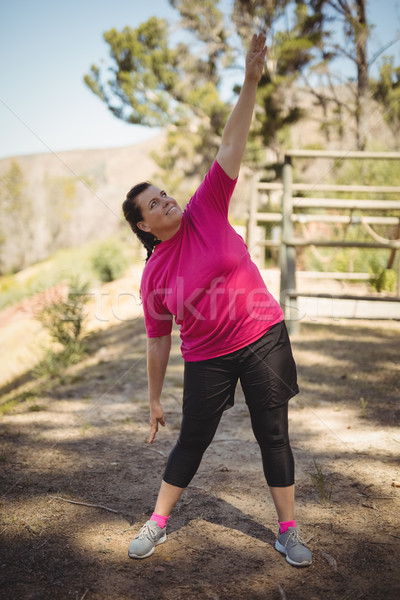 Nő testmozgás akadályfutás csizma tábor boldog Stock fotó © wavebreak_media