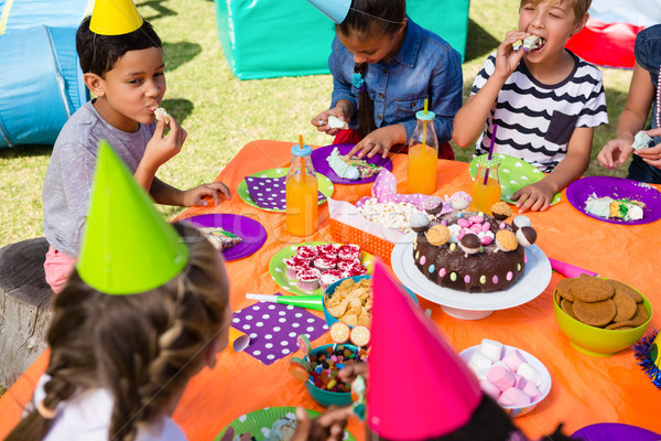 High angle view of children having cake at table Stock photo © wavebreak_media