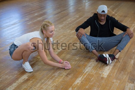 Full length of dancers warming up on floor Stock photo © wavebreak_media