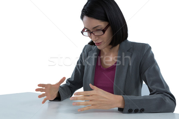 Businesswoman pretending to hold invisible object Stock photo © wavebreak_media